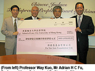 081009_receive_donation_1.jpg Thumbnail
